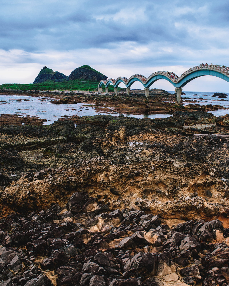 day, arch, sky, no people, arch bridge, solid, river, bridge - man made structure, sea, outdoors, scenics - nature, ocean, connection, island, architecture