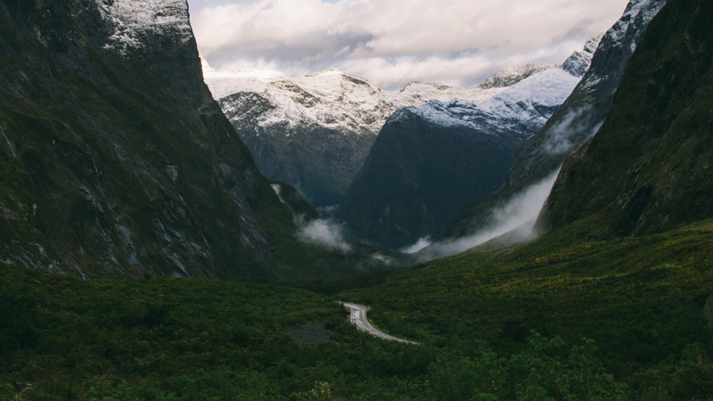 mountain range, trees, valley, outdoors, landscape, fog, sky, cold temperature, glacier, cold, snow, grass land, beauty in nature, scenics - nature, plant