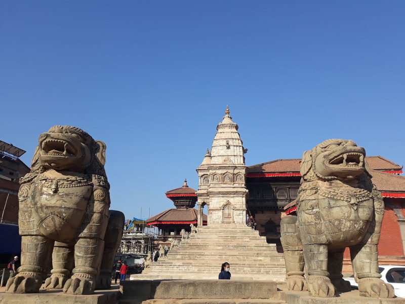 travel destinations, stone material, building exterior, human representation, square, 2K, history, nepal, located, sculpture, built structure, the past