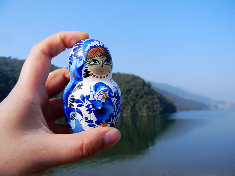 machhapuchhre, nature, matryoshka, human body part, human hand, focus on foreground, nepal, blue, sky, body part, tourism, 4K, outdoors, personal perspective