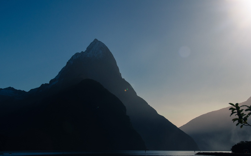 sky, dawn, mountain, non-urban scene, tranquility, nature, idyllic, sea, water, outdoors, mountain range, milford sound, mitre peak, rock - object, rock