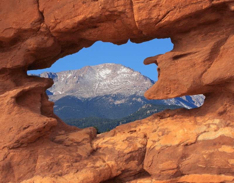 non-urban scene, rock formation, colorado springs, sky, hole, natural arch, solid, nature, tranquil scene, scenic, states, border, rock - object, formation