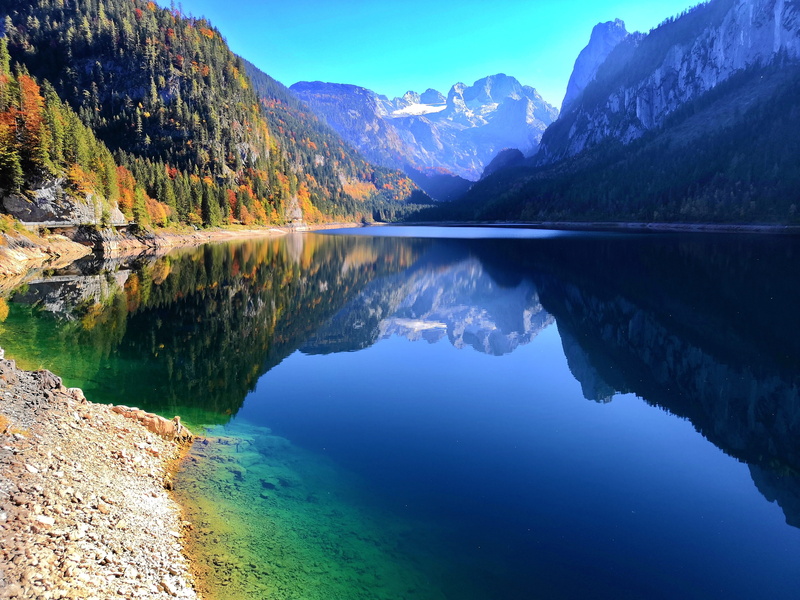 sky, no people, beauty in nature, scenics - nature, day, mountain, tree, non-urban scene, reflection, mountains, formation, nature, waterfront, water, green color