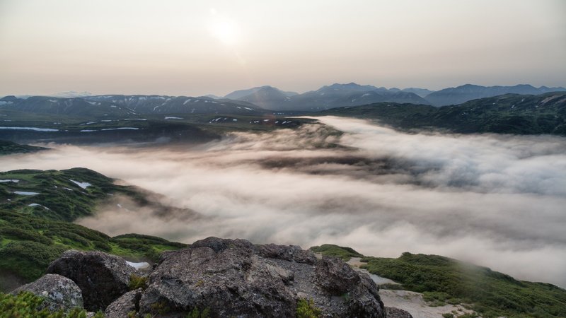 tranquil scene, scenics - nature, rock - object, cloud - sky, mountain range, beauty in nature, fog, sun, no people, solid, outdoors, tranquility, long exposure