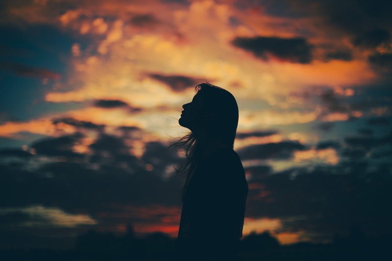side view, 1080P, real people, women, lifestyles, scenics - nature, contemplation, clouds, leisure activity, one person, waist up, sunset, sky, profile view
