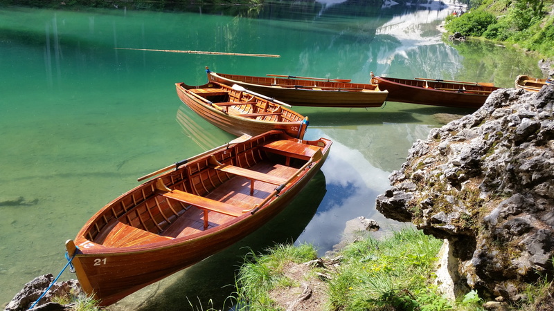 rock - object, beauty in nature, transportation, moored, nature, travel destinations, day, lake, tranquility, travel, mode of transportation, water, high angle view