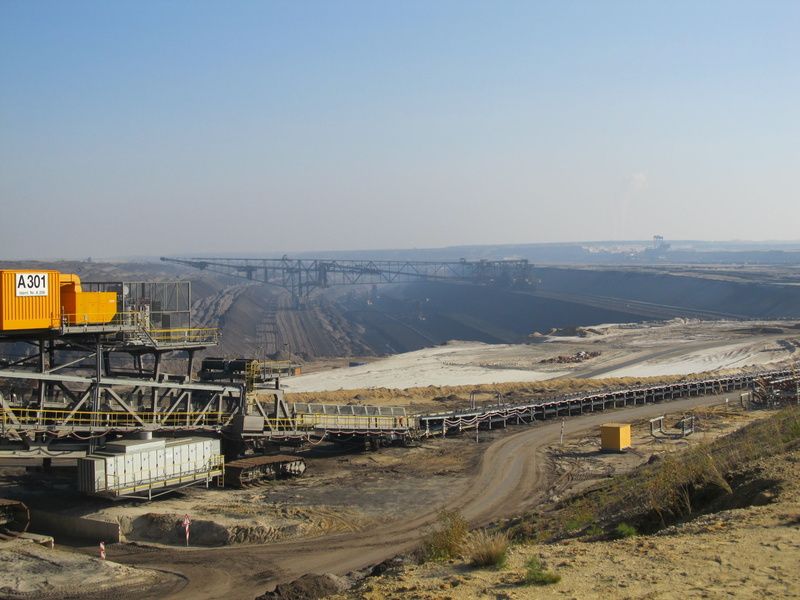 road, environment, clear sky, machinery, coal mine, energy, outdoors, brown coal, mining, mode of transportation, fuel and power generation, sky, no people