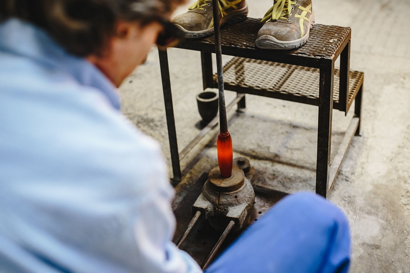 one person, Italy, industry, effort, expertise, one man only, machinery, workshop, glassworks, metal, blue, craft, Venini, outdoors, day, real people, glass factory