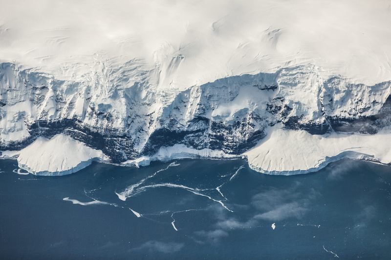 2K, covered, cliff, ocean, frontier, tranquil scene, coastline, aerial view, land, view, environment, water, power in nature, non-urban scene, cold, cold temperature
