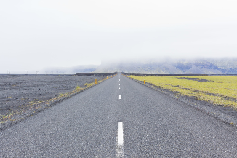 islandia, non-urban scene, asphalt, dividing line, no people, vanishing point, transportation, sign, diminishing perspective, marking, mountain, the way forward