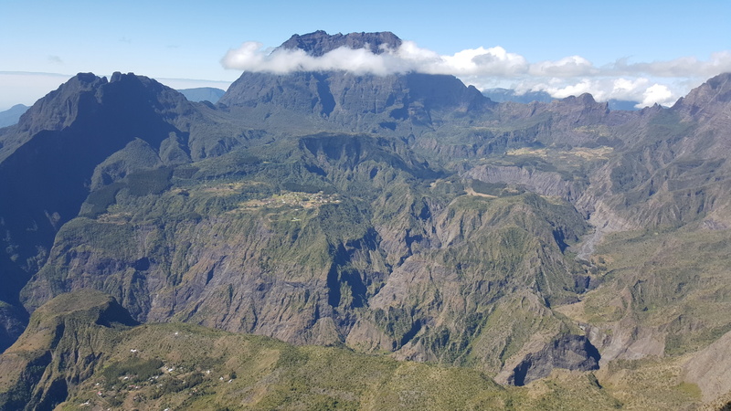tranquility, sky, mountain peak, formation, nature, no people, mountain range, piton des neiges, beauty in nature, physical geography, landscape meeting