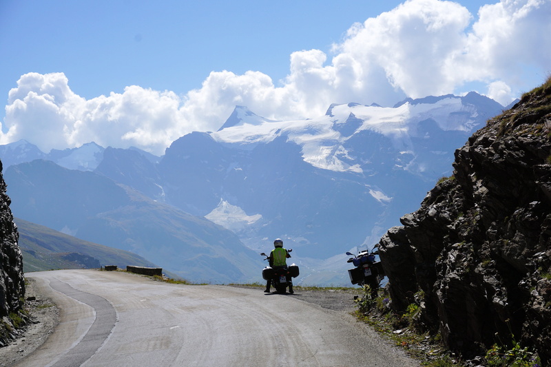 direction, formation, motorcycle, cold temperature, mountain, sunlight, bonneval sur arc, road, cloud - sky, transportation, mountains, 2018, snowcapped mountain