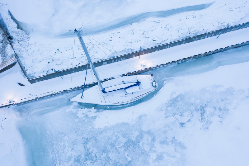 mode of transportation, transportation, water, white color, yacht, beauty in nature, waterfront, weather, snow, sea, white, scenics - nature, watercraft