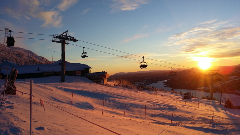 snow, transportation, sunlight, architecture, cable car, ski resort, cold temperature, downhill skiing, sky, sunset, cable, beauty in nature, piste, power supply
