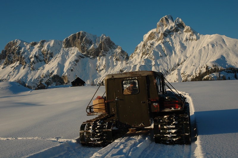 truck, travel, mountain range, mode of transportation, snow vehicle, alpine, snow landscape, day, motion, nature, winter, road, snow, mountains, formation