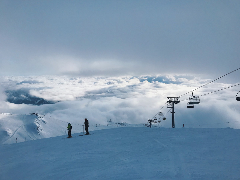 mountain, person, winter sport, scenics - nature, gudauri, clouds, skiing, sport, unrecognizable person, outdoors, sky, cold temperature, piste, sports