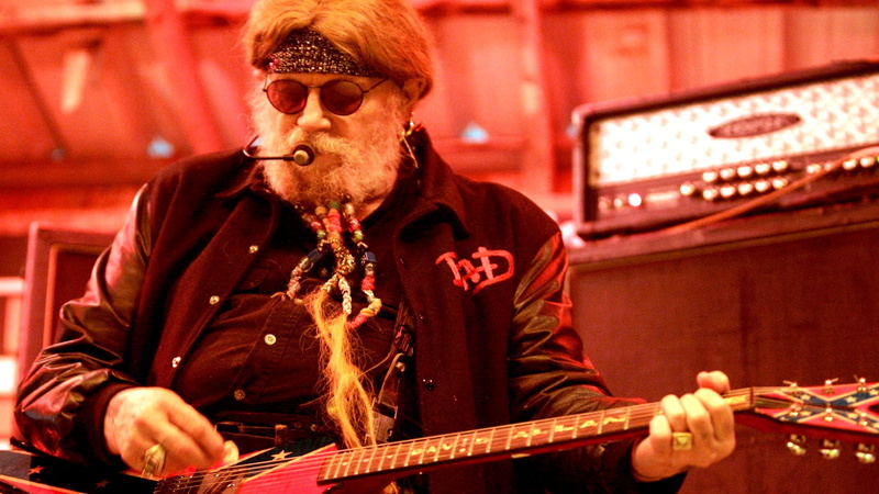 musical instrument, one person, skill, arts culture and entertainment, leisure activity, david allan coe, adult, glasses, string instrument, nightlife