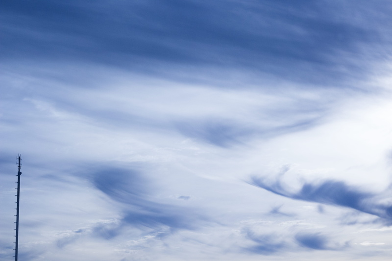 sky, no people, beauty in nature, white color, outdoors, low angle view, tower, power supply, meteorology, copy space, tranquility, blue, nature, 5K, day