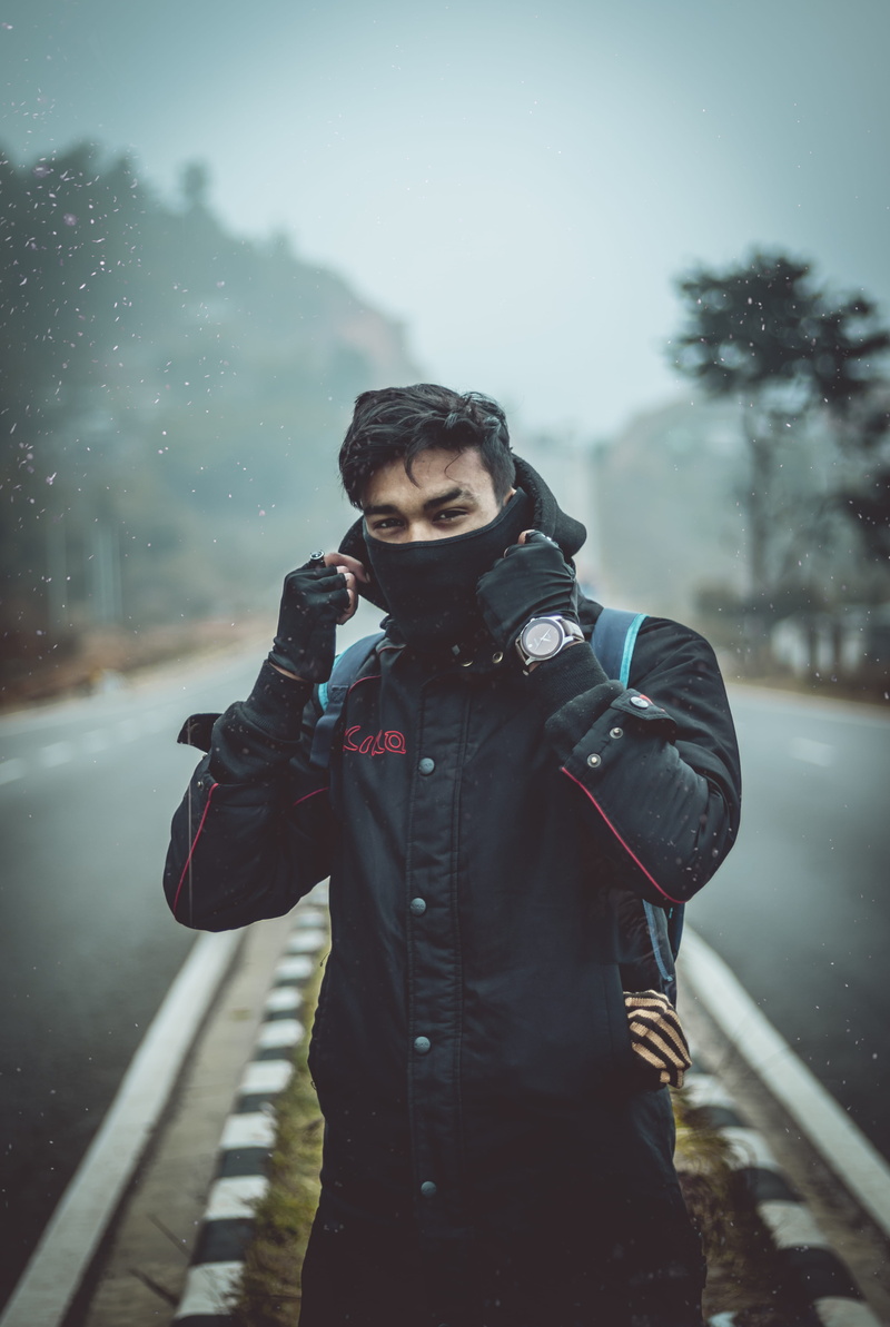 three quarter length, black, mask, outdoors, man, overcoat, young men, outdoor, leisure activity, waist up, cold, india, one person, highway, road, person