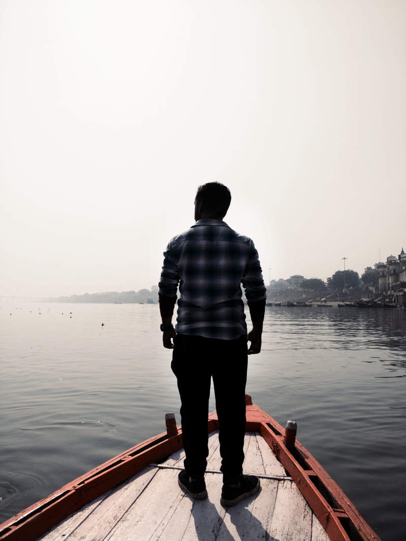tranquility, looking at view, outdoors, copy space, water, transportation system, sea, leisure, lifestyles, lake, wooden, person, full length, fisherman