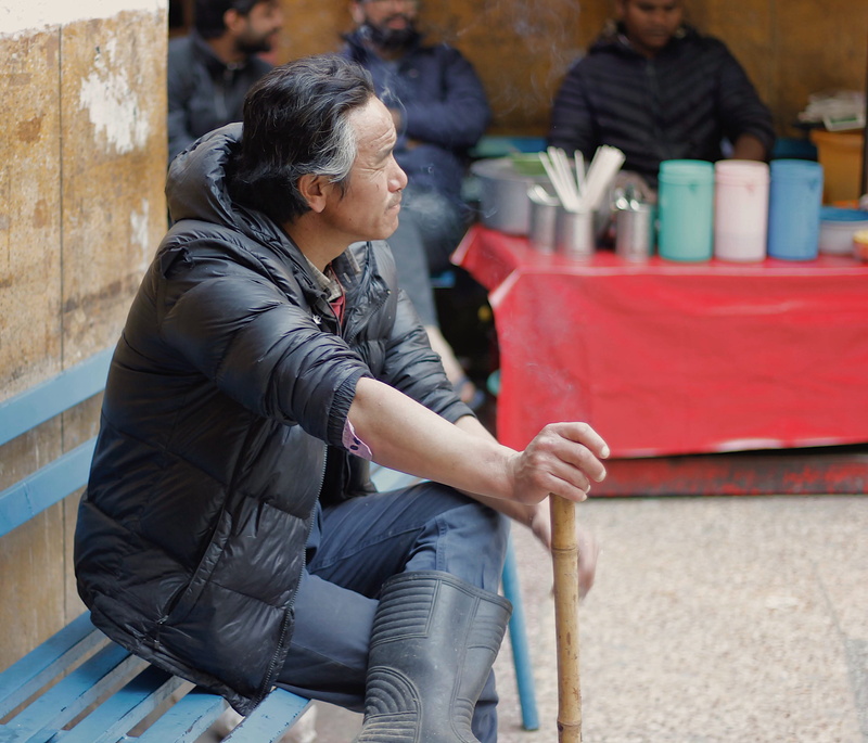 adult, side view, powerful, one person, males, india, delhi, indian men, lifestyles, portrait, focus on foreground, sitting, apparel, pants, leader, smoke