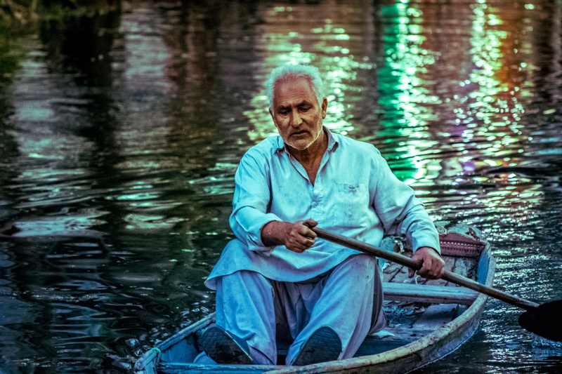 colors in water, portrait, man riding boat, real people, occupation, old man, color portrait, adult, focus on foreground, day, autumn, males, one person