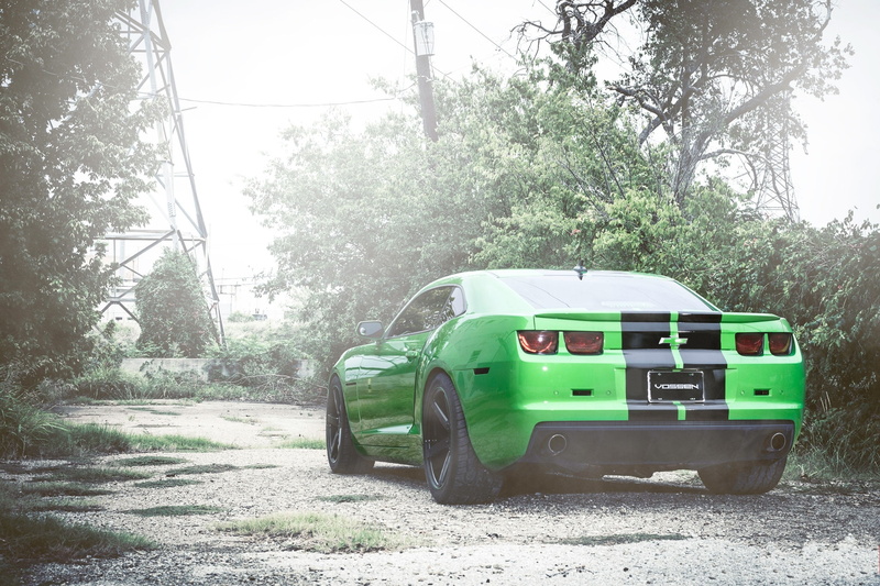 green, growth, land vehicle, motor vehicle, sunlight, back, stationary, car, road, transportation, day, high-voltage support, land, plant, nature, post