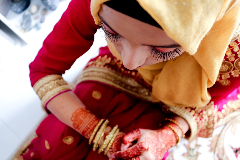 dress, bracelet, adult, bangle, scarf, beautiful woman, celebration, tattoo, eid, saree, indoors, women, young adult, midsection, red, hijab, muslim, traditional clothing