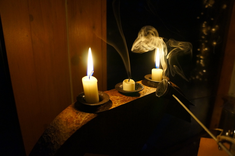 heat - temperature, glowing, no people, wood - material, night, smoke, illuminated, candlestick holder, nature, close-up, black background, indoors, fire - natural phenomenon