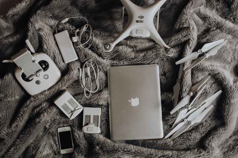 macbook, accessories, connection, 4K, lie, laptop, book, bed, table, large group of objects, eyeglasses, dji, no people, directly above, ready, high angle view
