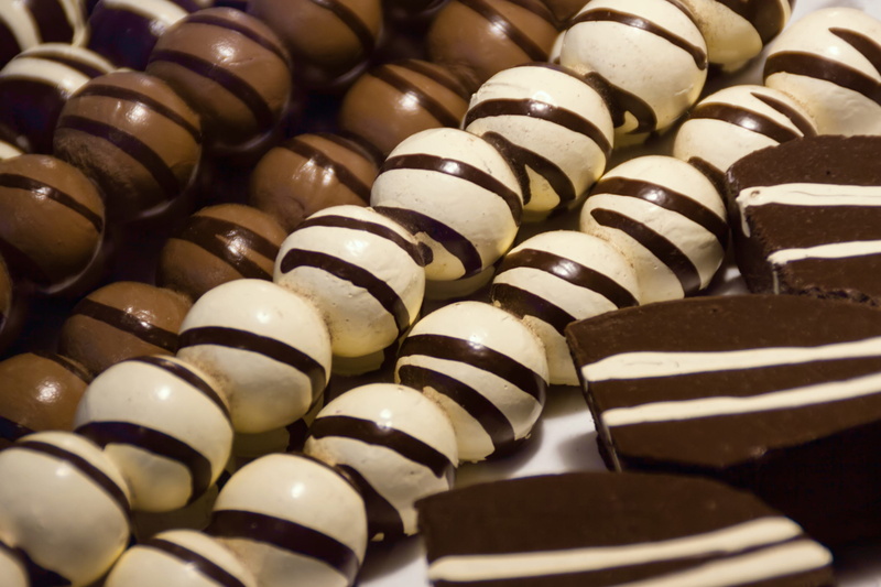 food and drink, egg, candy, icing, temptation, sweet, selective focus, close-up, creme, cocoa, large group of objects, freshness, sweets, cream, food, abundance