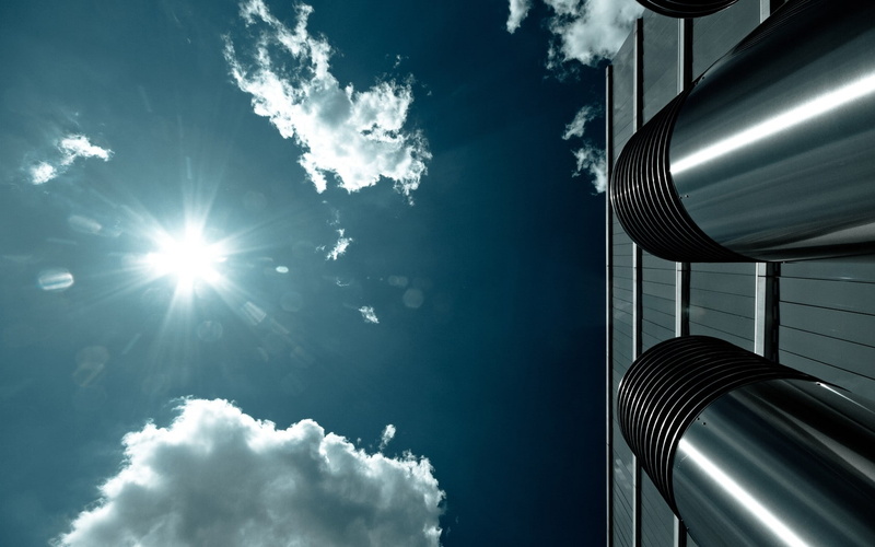 sunlight, day, cloudscape, architecture, skyscraper, lens flare, sky, directly below, clouds, blue, nature, office building exterior, 720P, sun, no people