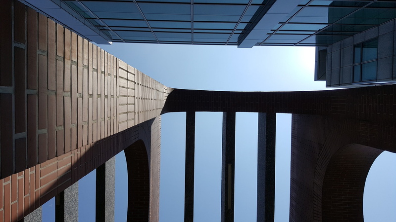 directly below, no people, office building exterior, pattern, bricks, 1080P, building, skyscraper, arch, office, shadow, window, sky, built structure
