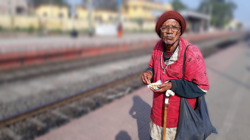adult, lifestyles, mature adult, old, transportation, standing, outdoors, portrait, street, focus, real people, senior adult, track, holding, train, red