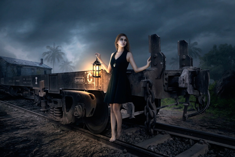 full length, holding, night, railroad track, mini, young adult, standing, painting, mode of transportation, women, cloud - sky, smoke - physical structure