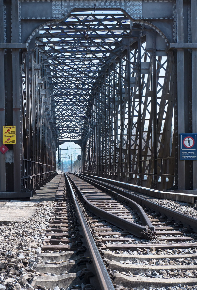 metal, railroad track, transportation, long, outdoors, direction, railway, day, route, no people, public transportation, bridge - man made structure, viaduct