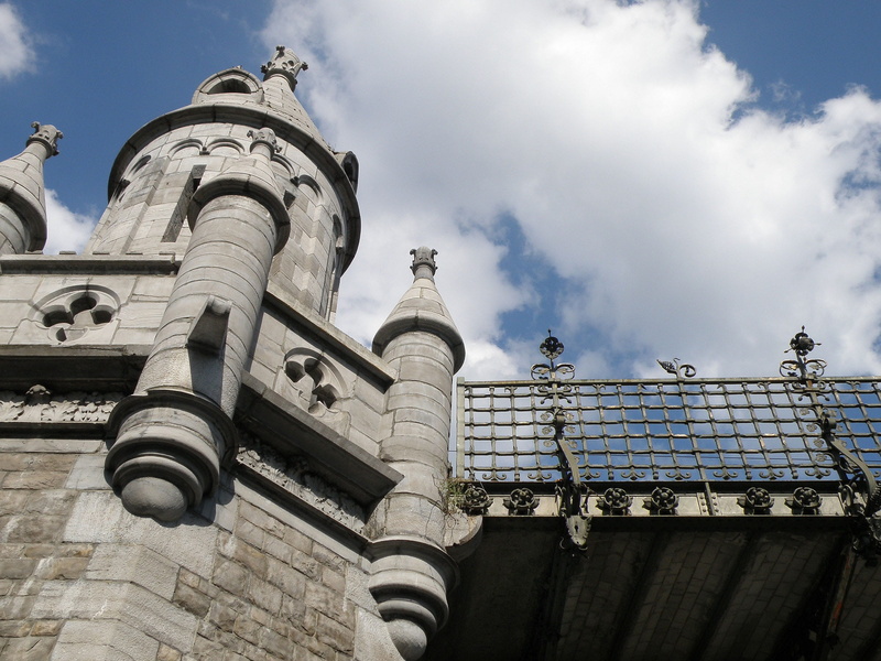 building exterior, cloud - sky, railway, no people, Viaduct, low angle view, Antwerp, outdoors, religion, sculpture, day, representation, crossing, the past