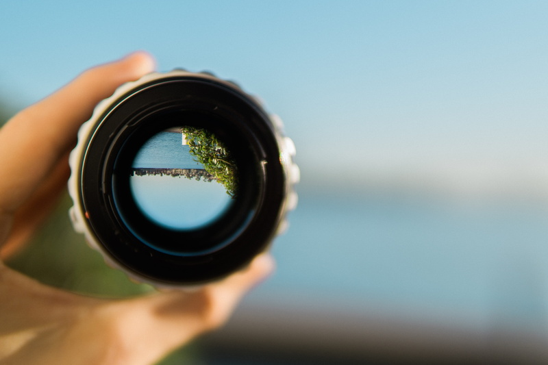 photographic equipment, sky, selective focus, lens, body part, 5K, finger, camera - photographic equipment, trees, nature, digital camera, portra 400