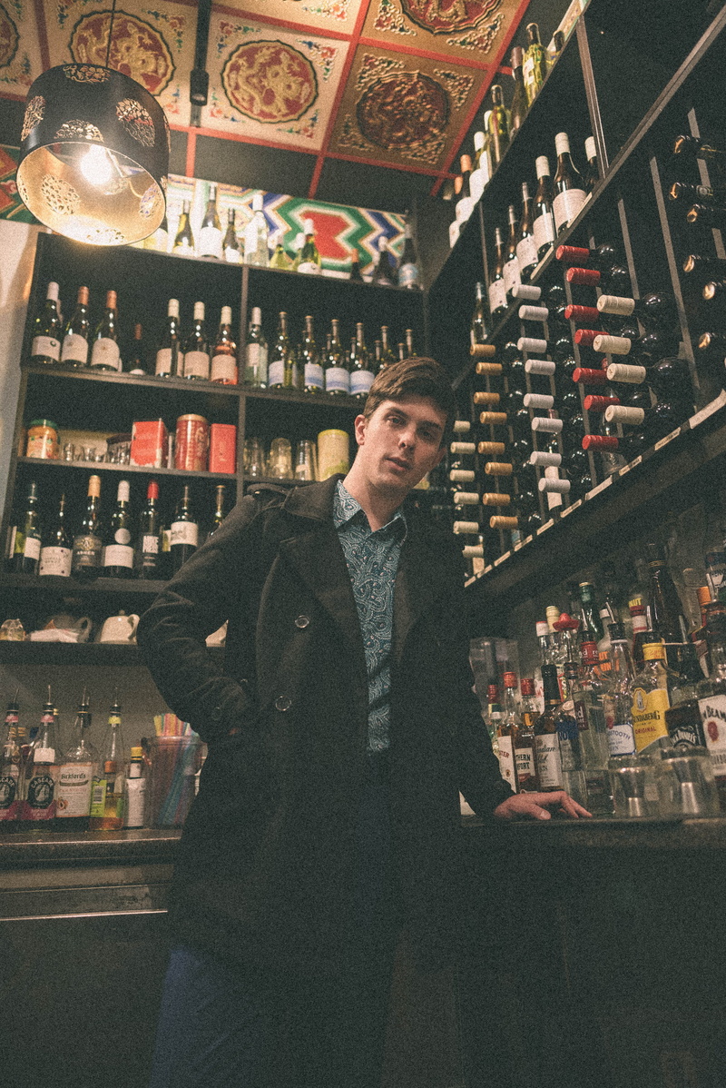lifestyles, fuji pro, illuminated, choice, casual clothing, real people, bar counter, retail, 5K, young adult, one person, standing, store, retro, vintage