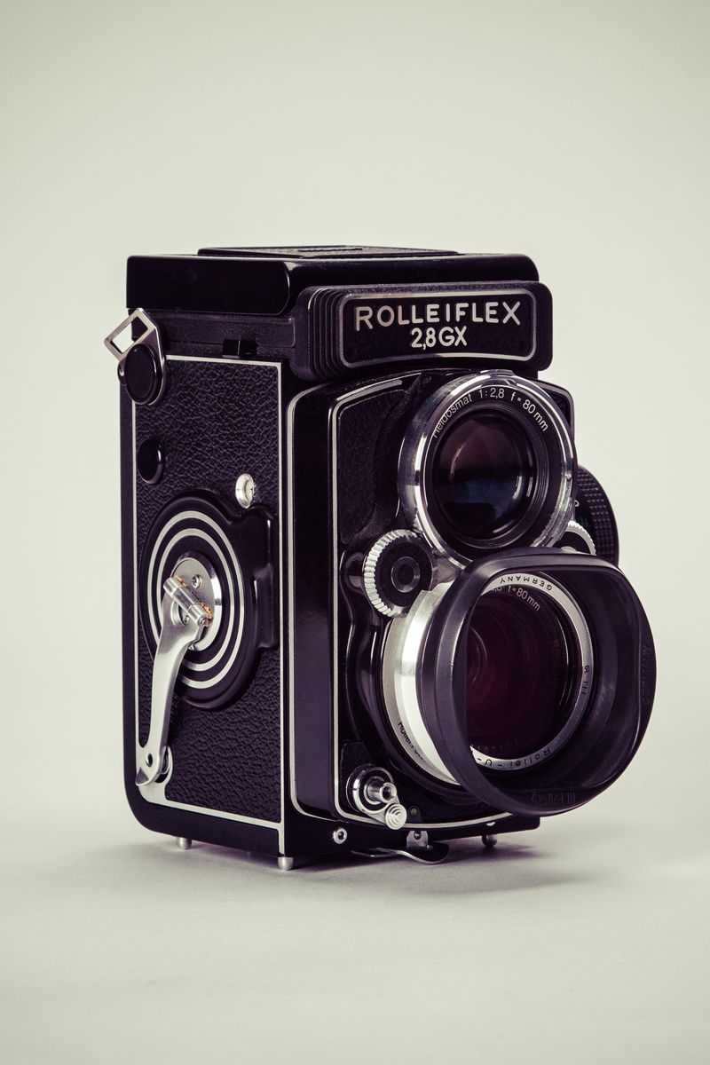 digital camera, 2K, no people, black, white background, studio shot, camera - photographic equipment, photography themes, indoors, lens - optical instrument