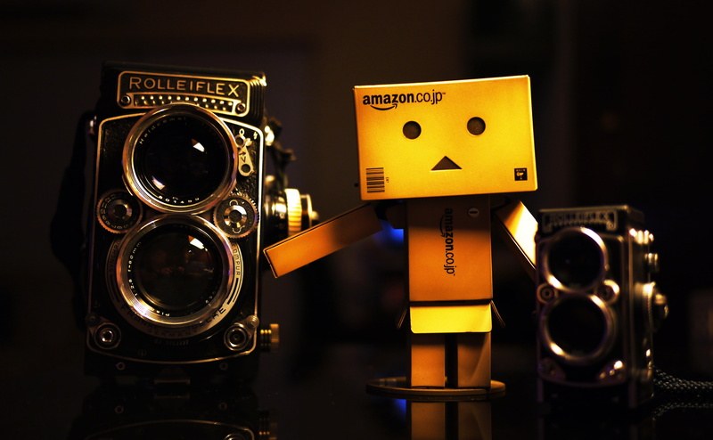 rolleiflex, black background, indoors, representation, Creative, focus on foreground, creativity, silver colored, brown, no people, old camera, illuminated