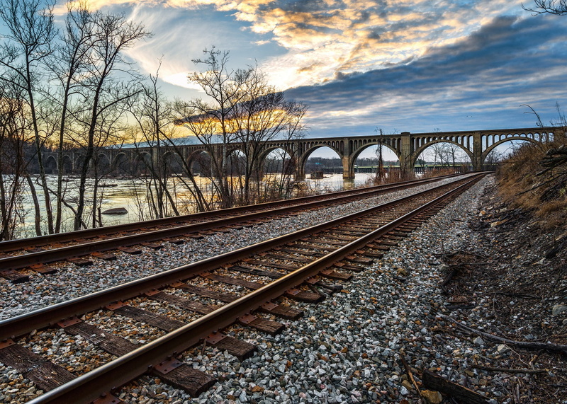 railway, landscape, outdoors, gravel, cloud - sky, bridge - man made structure, bridge, the way forward, arch bridge, no people, sky, railroad track, connection