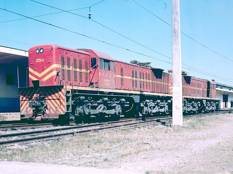 railroad track, clear sky, train - vehicle, rail transportation, business, freight train, sky, railroad car, R.F.F.S.A, public transportation, day, travel