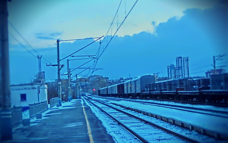 outdoors, train station, track, sky, electricity, railroad track, public transportation, transportation, rail transportation, no people, architecture, mode of transportation
