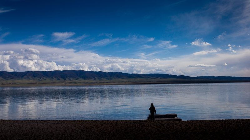 nature, sitting, lake, mountain, animal wildlife, gansu province, sky, contemplation, scenics, tranquil scene, people, beauty in nature, xining, land, looking at view