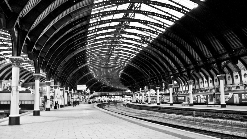 public transportation, incidental people, indoors, England, architecture, built structure, mode of transportation, travel, arch, 2K, group of people, transportation