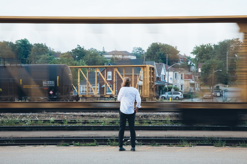 railroad, 20-25 year old, rail transportation, wrist watch, outdoors, fast, public transportation, transportation, men, platform, 2K, look over shoulder