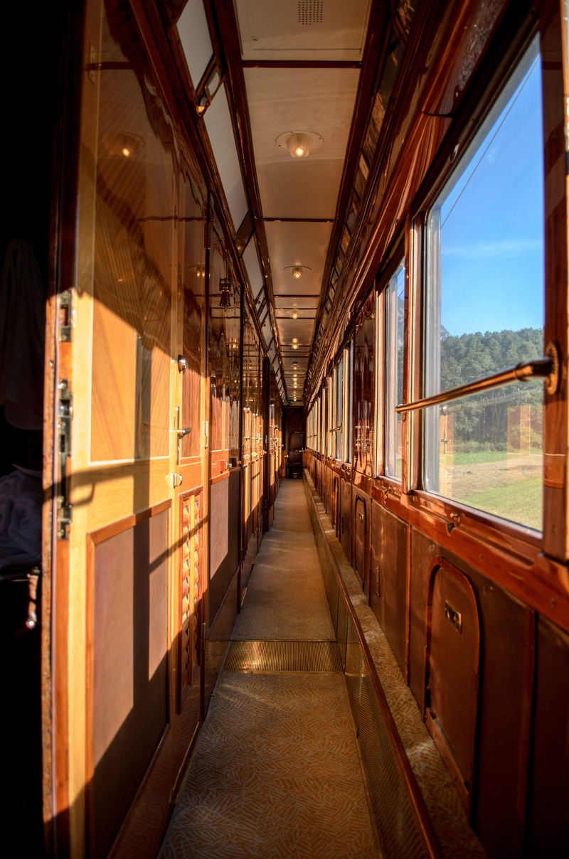 no people, architecture, hallway, absence, transportation, direction, indoors, window, wood, train, the way forward, orient-express, luxury, vehicle interior