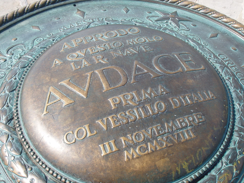 coin, no people, currency, number, sailor, wind, bora, shape, memory, text, geometric shape, Pier, communication, capital letter, history, message, architecture