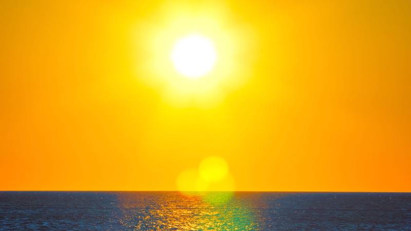yellow, beauty in nature, orange color, sun, bright, no people, sunlight, urban skyline, nature, scenics - nature, tranquility, sea, sky, tranquil scene